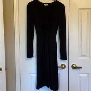 Stretch black dress. Deep neck line